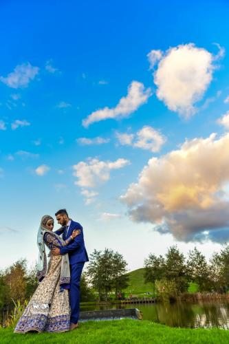 romantic couple in cloudy meadows